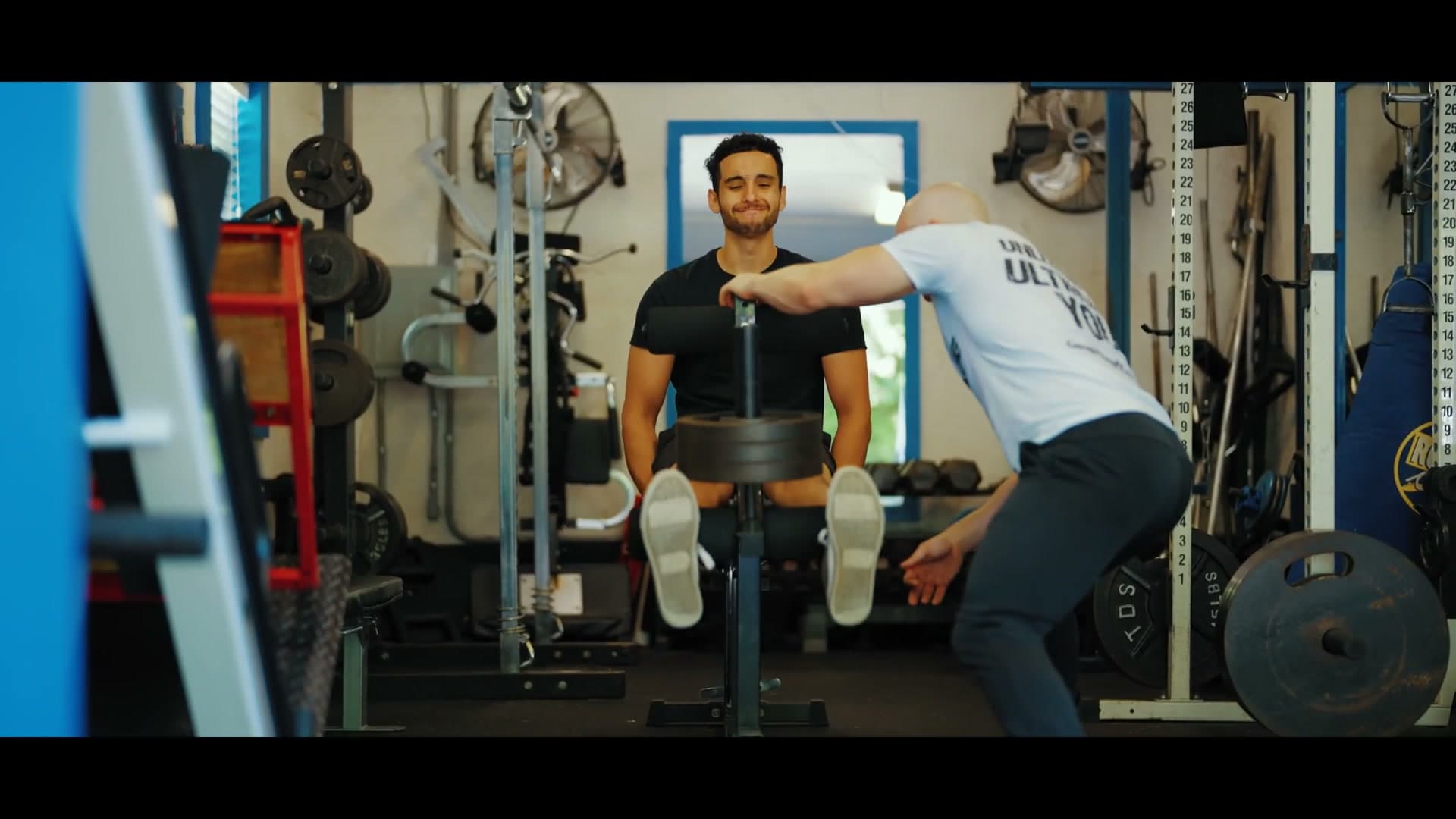 Gordon coaching a client in the Garage Fitness gym